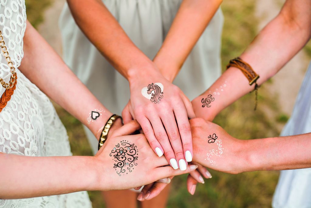 close up of female hands, three girls, best friends, flash tatto